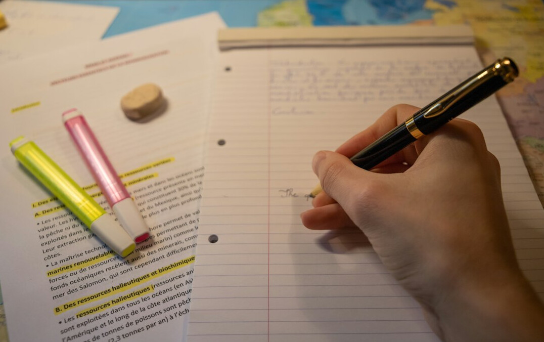 writer planning plot on paper